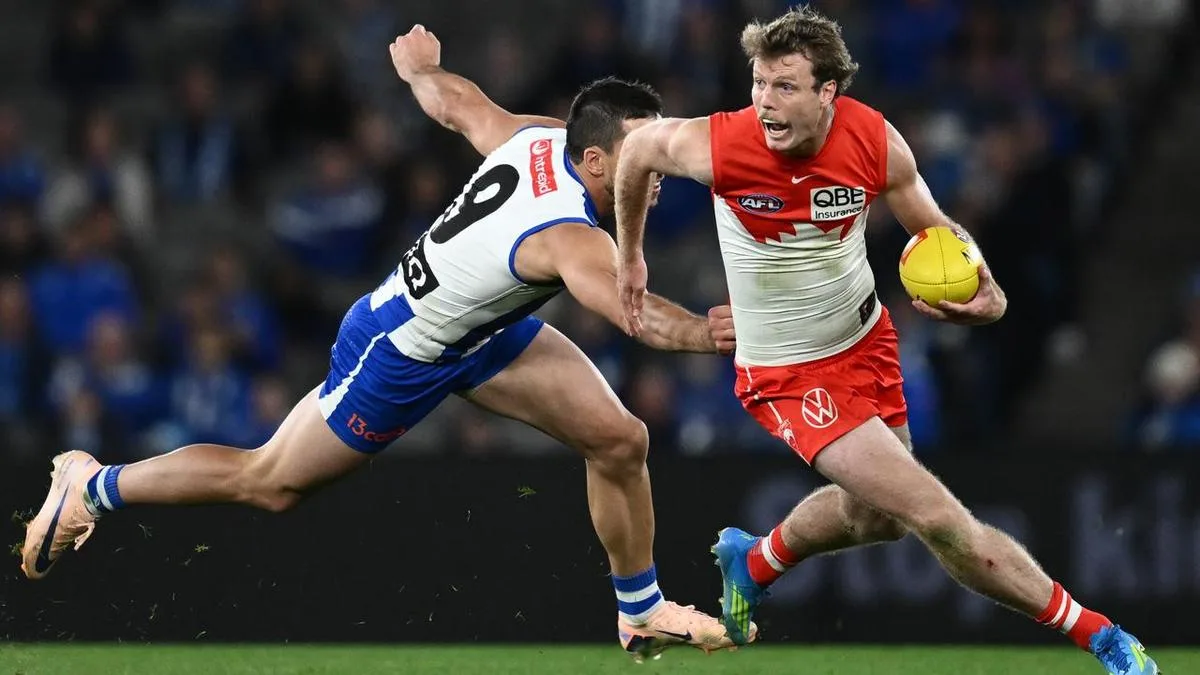 Sydney Swans trade star defender to North Melbourne