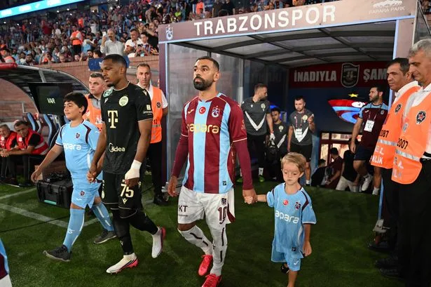 Mo Salah's heartwarming reunion with biggest fan Isaac after leaving Liverpool