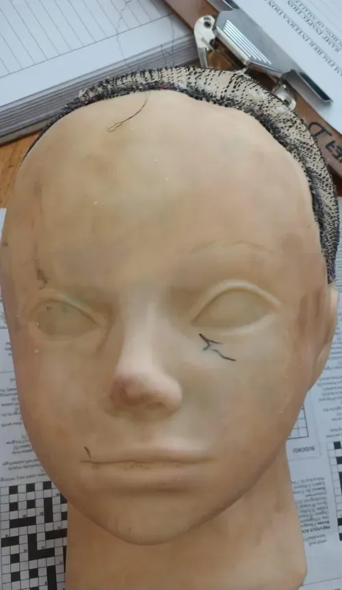 Police seize drugs hidden in hairdresser doll head at airport