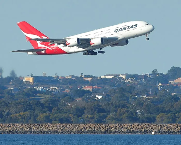 Qantas profits dip to lowest in four years as jet fuel costs climb after Iran conflict