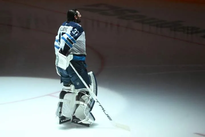 Winnipeg Jets fan tracks Hellebuyck’s lost salary with ‘funny, informative’ site