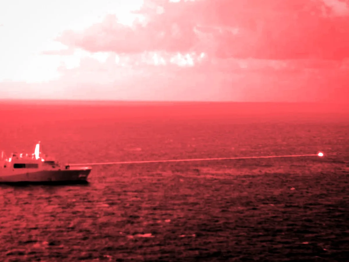 The US Navy's top admiral says lasers are key to keeping cheap drones from eating into warship missile magazines