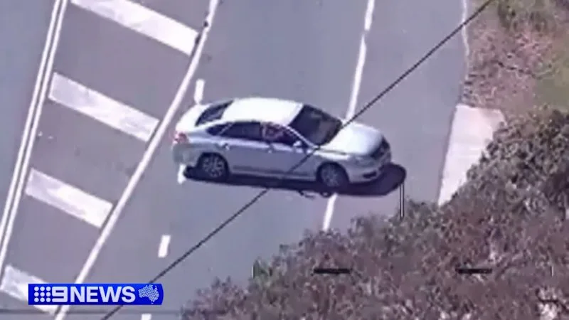 New footage shows moment man allegedly opens fire on police helicopter