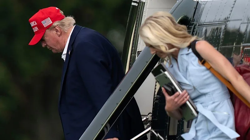 Trump berates reporter who asked about his relationship with female staffer