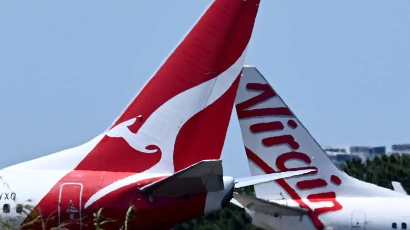 Qantas and Virgin are making billions but airfares still aren’t coming down