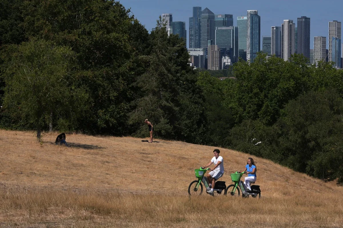 A series of heatwaves leads Britain to record its hottest summer