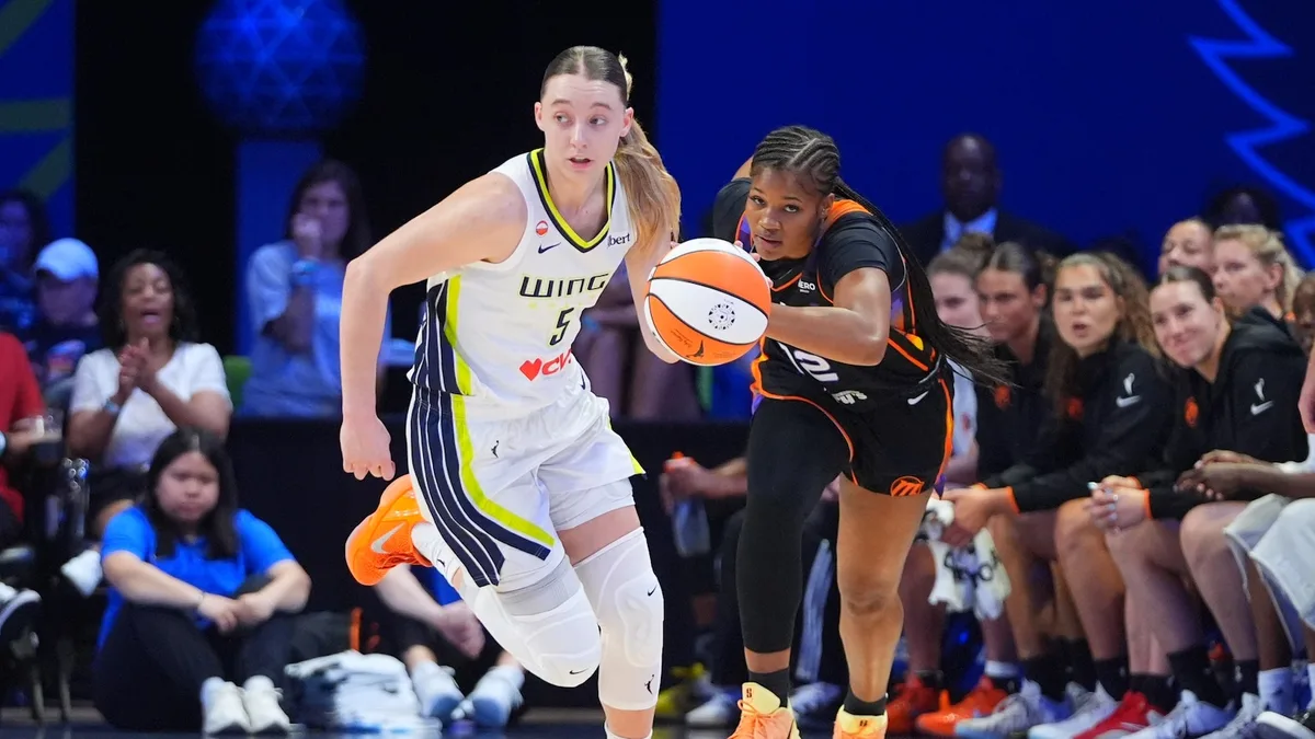 Bueckers scores 20 of her 26 in 1st half and the Wings beat the Mercury 87-82 for 6th straight win