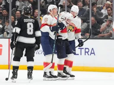 Panthers forward Brad Marchand sustains left leg injury in second period against Kings