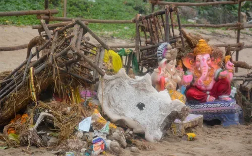 Ganesha idols and immersion waste litter beach