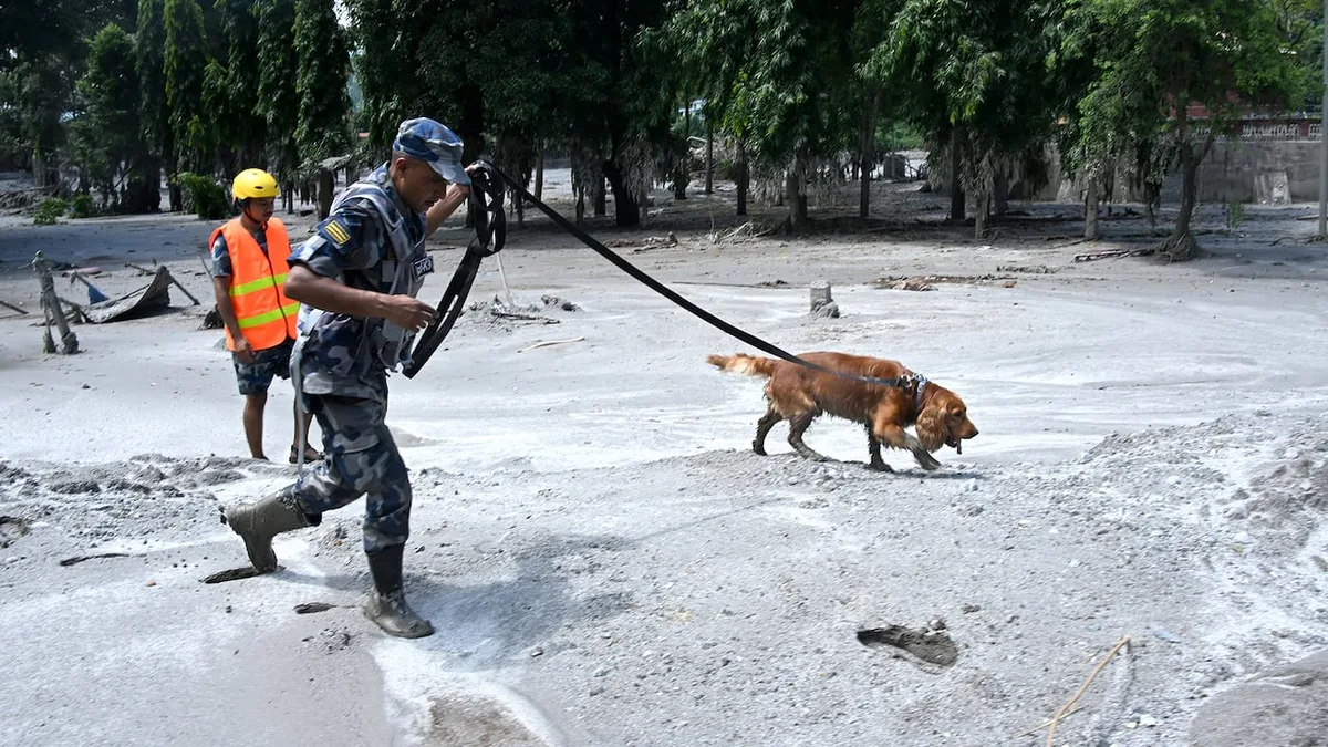 Death toll rises in Nepal-China border disaster as lake poses new flood threat