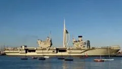 Royal Navy aircraft carrier departs for training