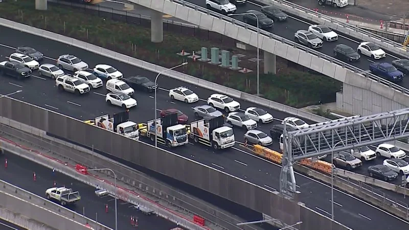 Car catches alight in Sydney tunnel, causing commuter chaos