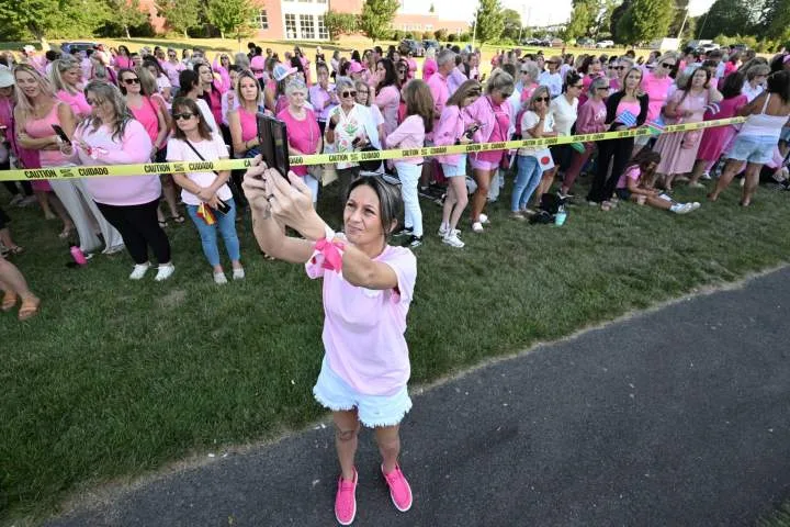 Hundreds of women in pink rally in support of Lindsay Clancy during trial