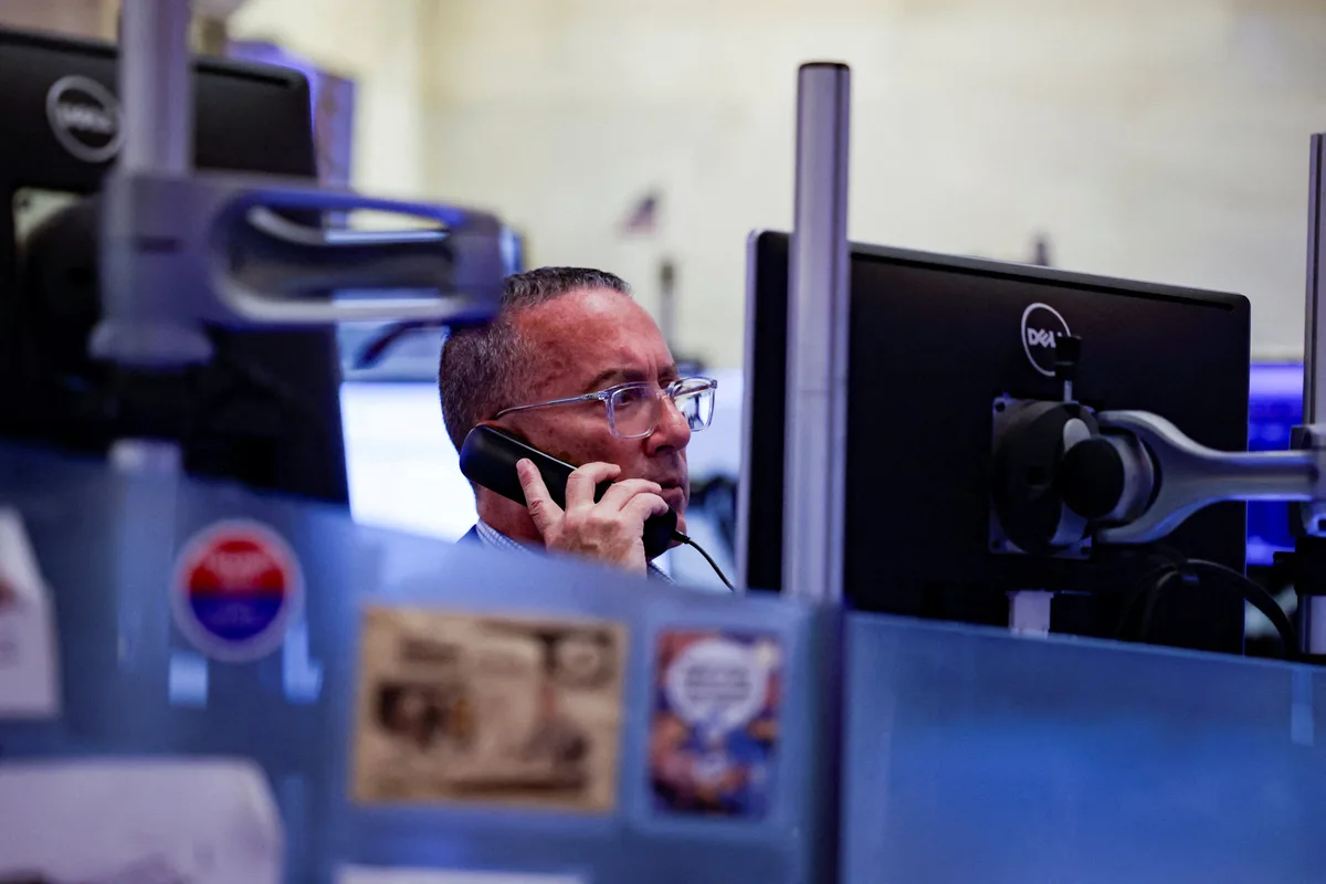 TSX edges down to two-week low as financial shares slide