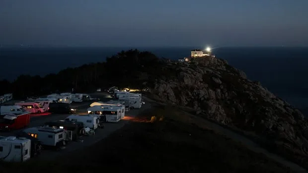 Spain dealing with influx of solar eclipse tourists while still battling wildfires