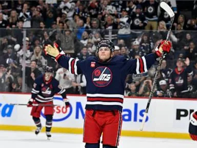 Jets beat the Wild 5-2 as Cole Perfetti scores 2 goals