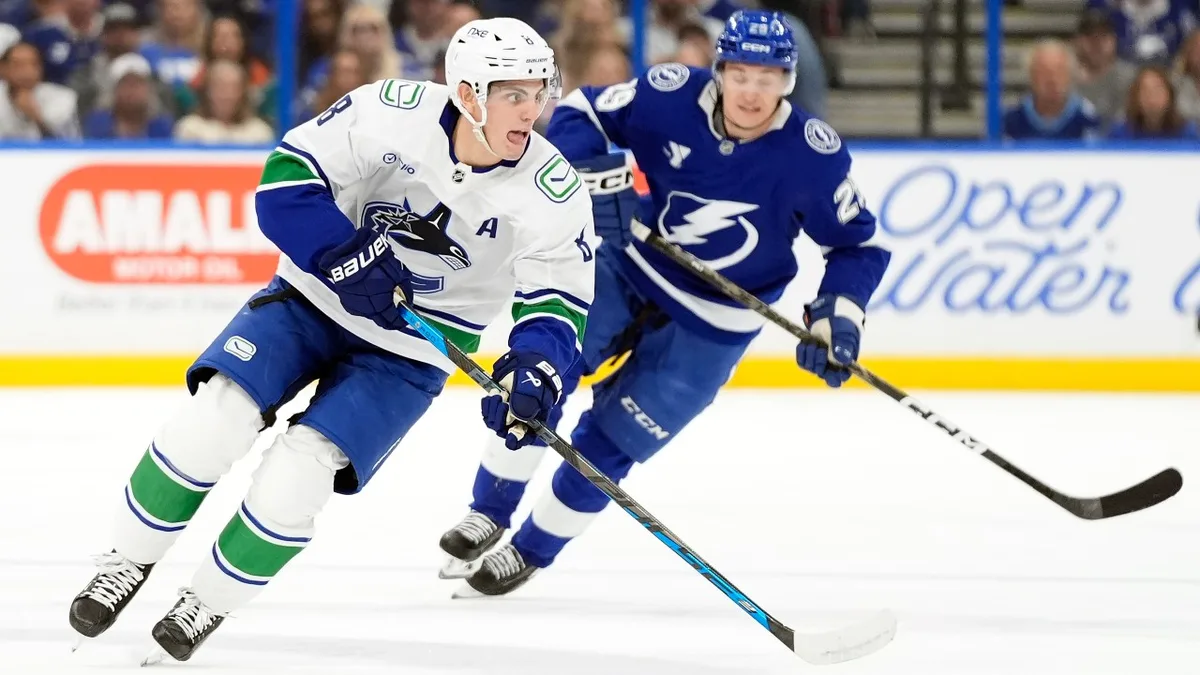 Canucks blow two-goal lead vs. Lightning in seventh straight loss