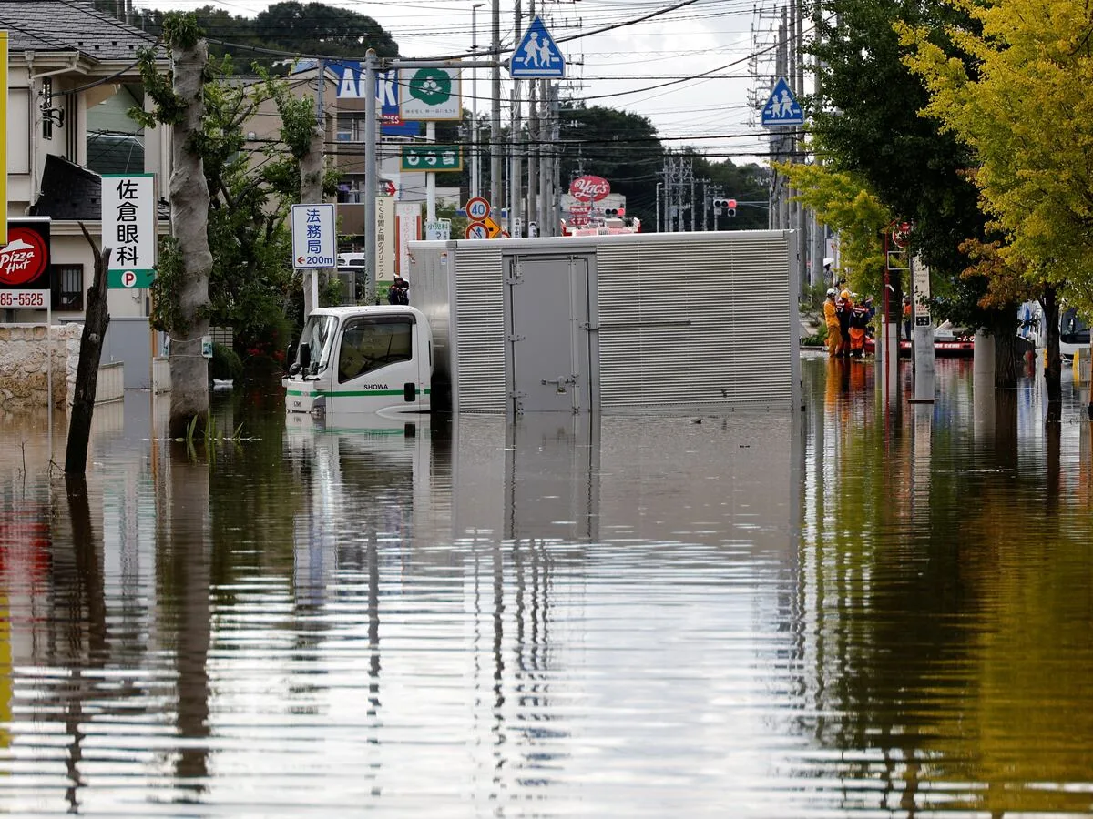 Torrential rains brought by Japan typhoon kill four, broadcaster says