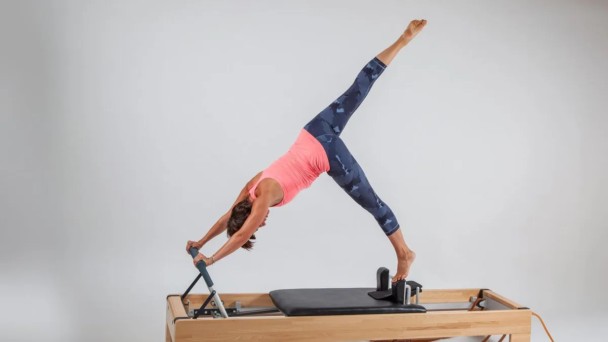 Selbstversuch: Hart, aber hilfreich – wie ich mit Reformer-Pilates meine Rückenschmerzen bezwang