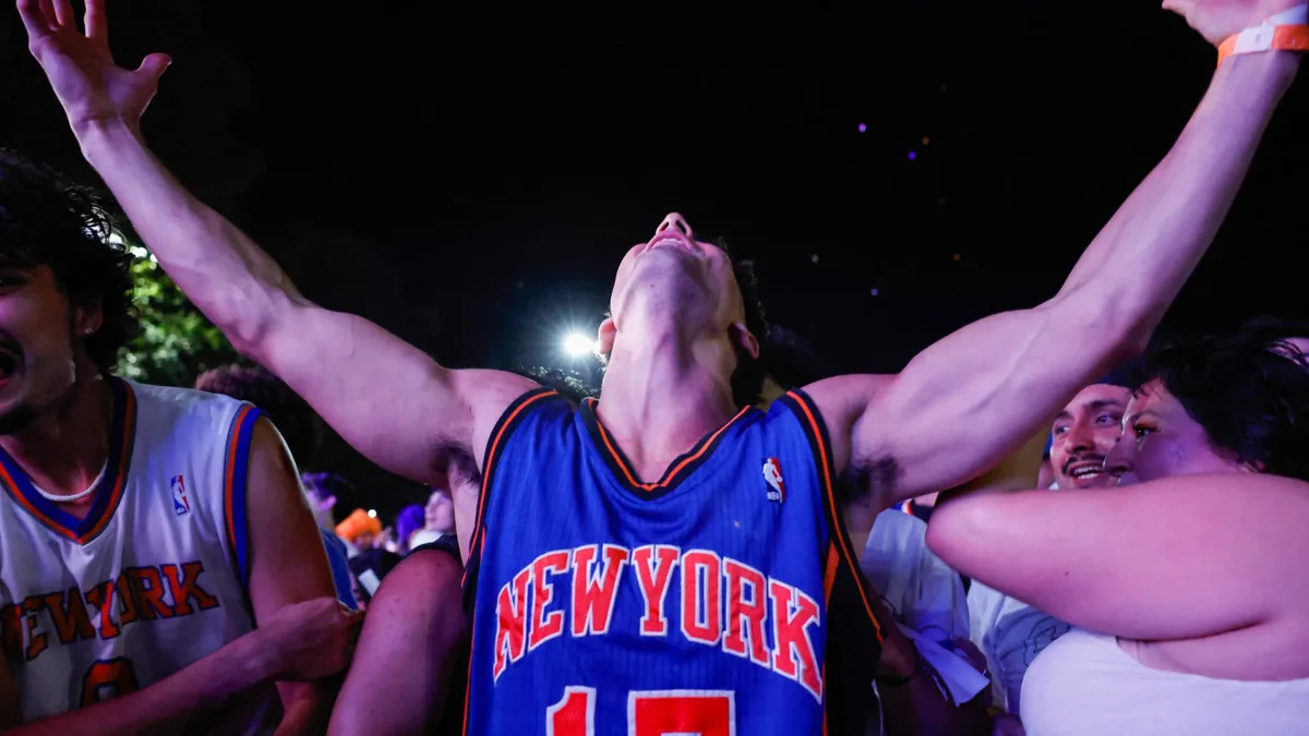 U.S. sports fans spend about $2,000 a year on their favorite teams—many find themselves in debt as a result