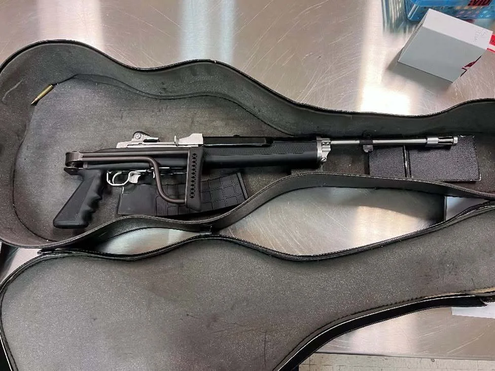 Gun-toting suspect hid rifle in a guitar case, police in Northern California say