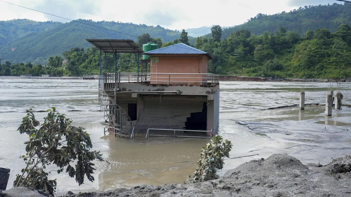 ‘Mother was swept away’: Nepal flood survivors cling to hope amid search for missing