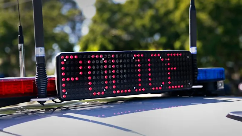 Police officer, man fall six metres in shopping centre pursuit