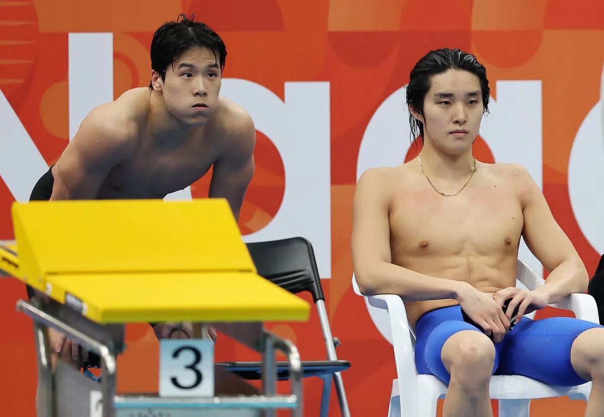 ‘어깨 부상’ 김우민, 주 종목 400m도 포기…대회 조기 마감