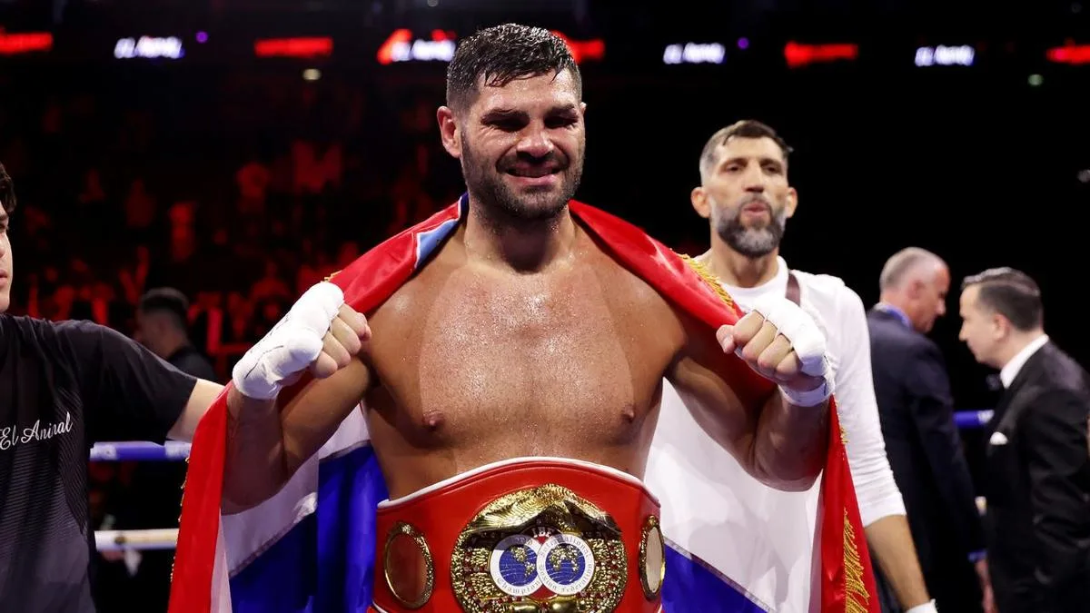 Battered Croatian stops wonderkid for heavyweight title