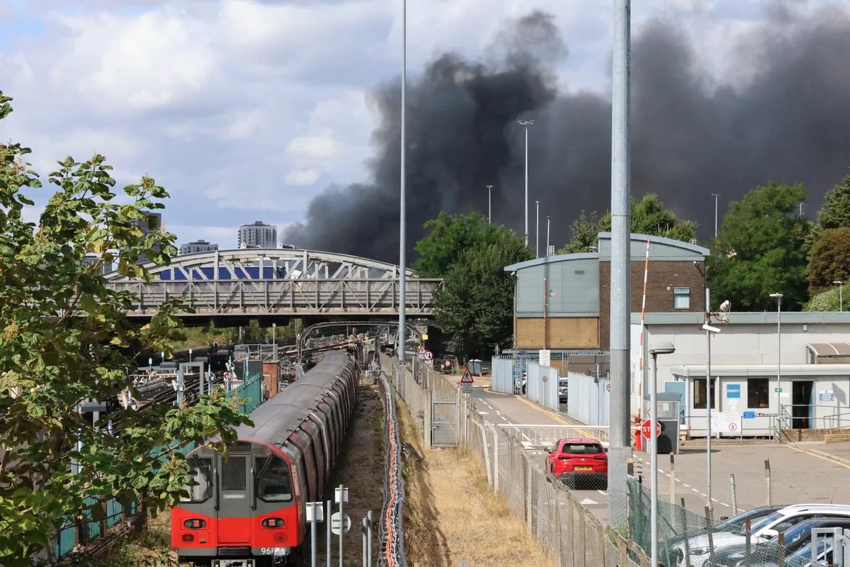 Third day of Tube disruption as 'toxic air' from huge blaze near Wembley Stadium prevents trains running