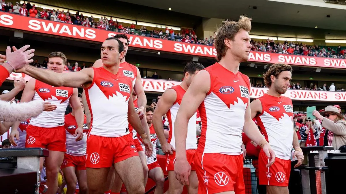 Swans win first AFL game after hotel scandal