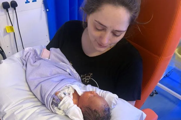 'My baby's condition means I can't hold or bathe him and we rarely leave the house'