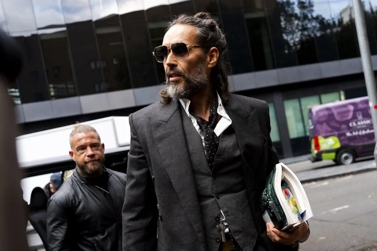 Russell Brand’s first accuser ‘feared she may be pregnant after hotel attack’