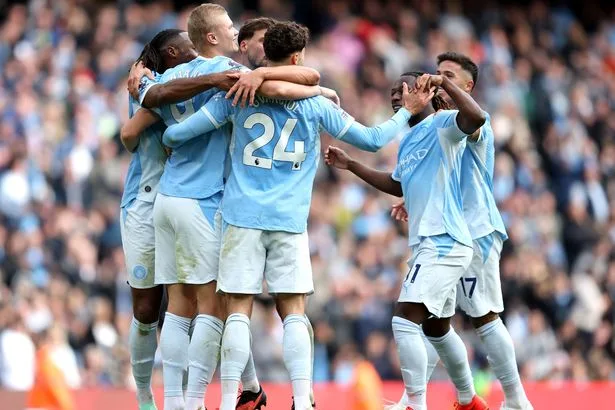 Man City beat Sunderland in eight-goal thriller to move three points clear at top