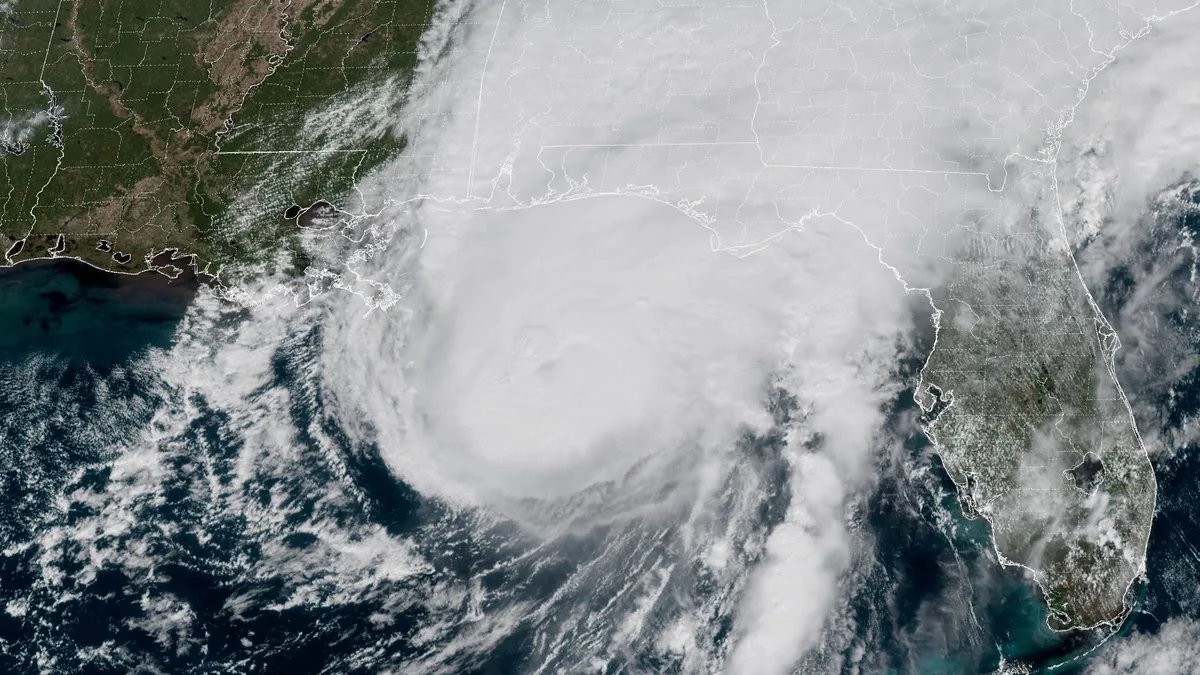 'The storm is here - buckle down': Hurricane Isaias makes landfall in US