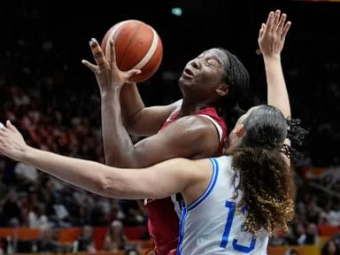A gritty late surge lifts the US past Italy 55-52 in its toughest World Cup test in years