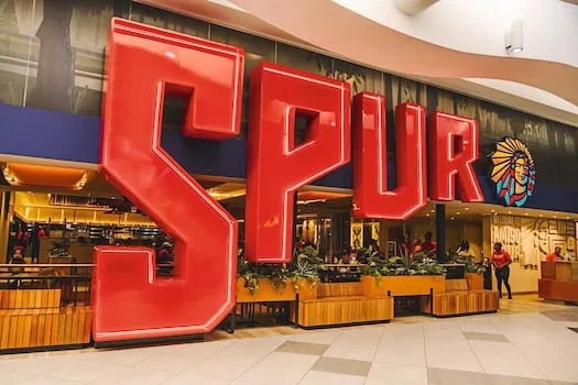 Ribs lawsuit bites into Spur’s profit