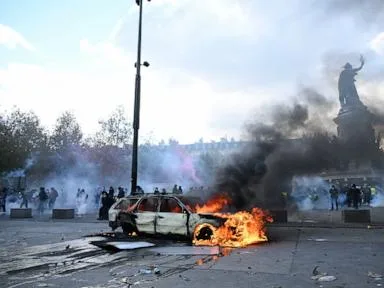 Protesters across France rally over rising living costs, joining students' grievances
