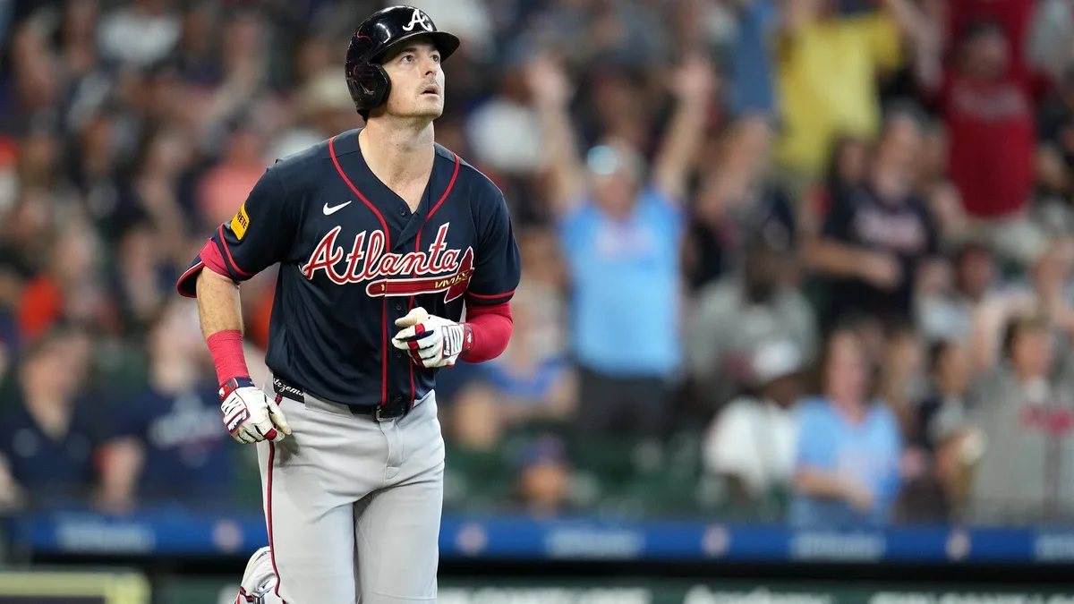 Yastrzemski hits a 3-run homer and the Braves clinch the NL East title with 4-2 win over the Astros