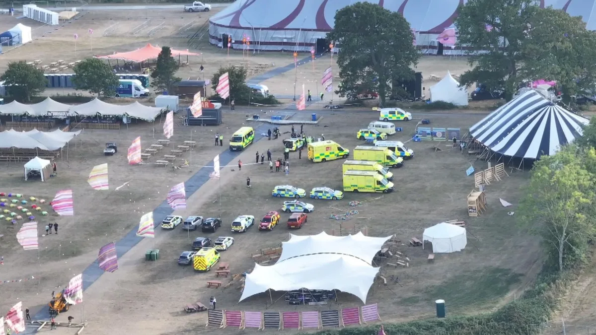 Man killed and six injured after large sign falls at Christian festival