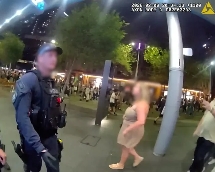 Footage shows police officer boasting about 'punching' an anti-Herzog protester in the head – video
