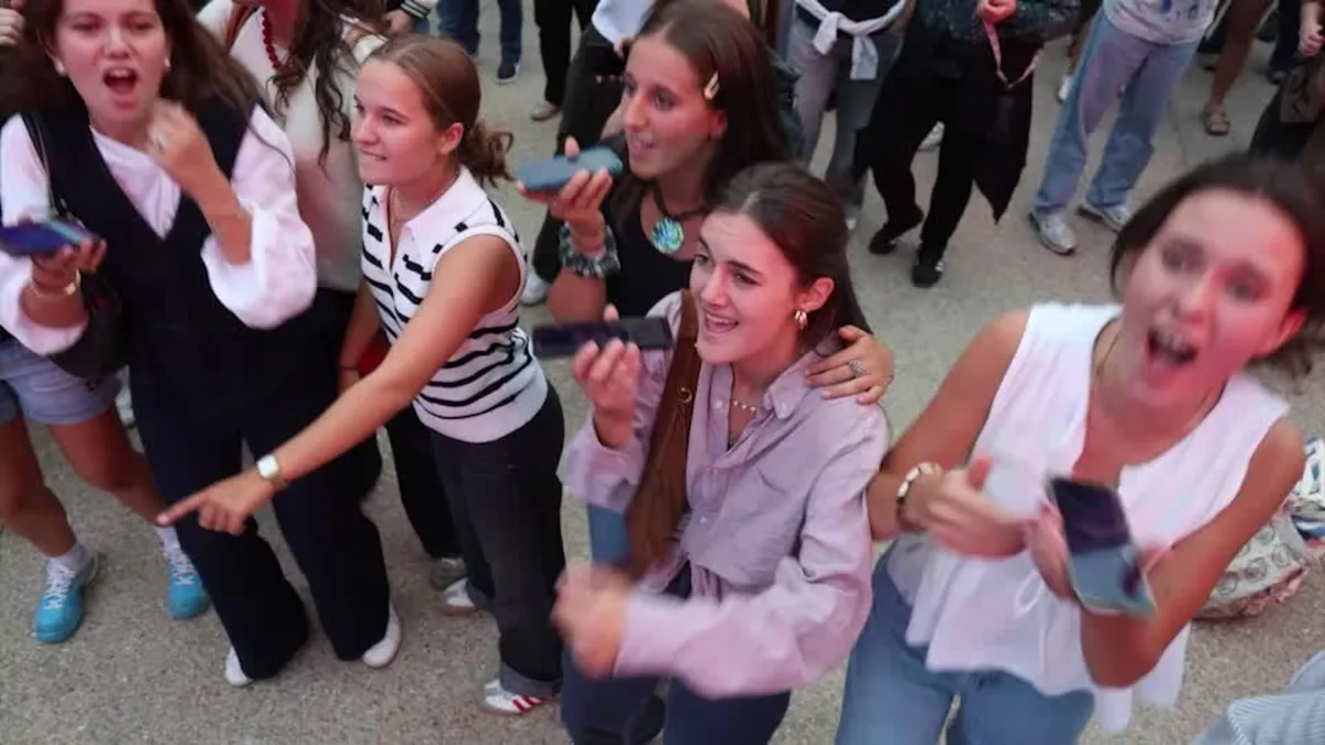 Thousands in Paris belt out Celine Dion tunes at outdoor karaoke event
