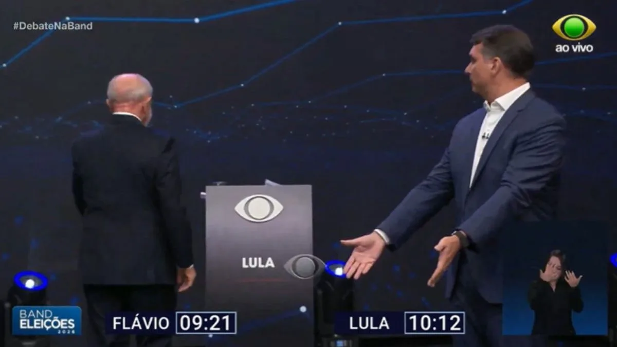 Flávio Bolsonaro e Lula entram em embate sobre a ‘saidinha’ de presos em debate e clima esquenta