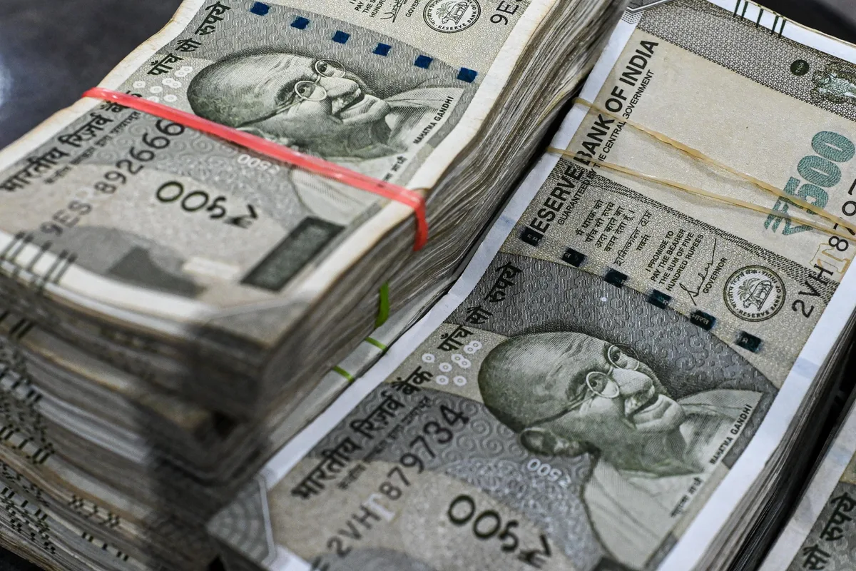 Rupee leads Asian currencies; bond yields ease as crude slips below $90