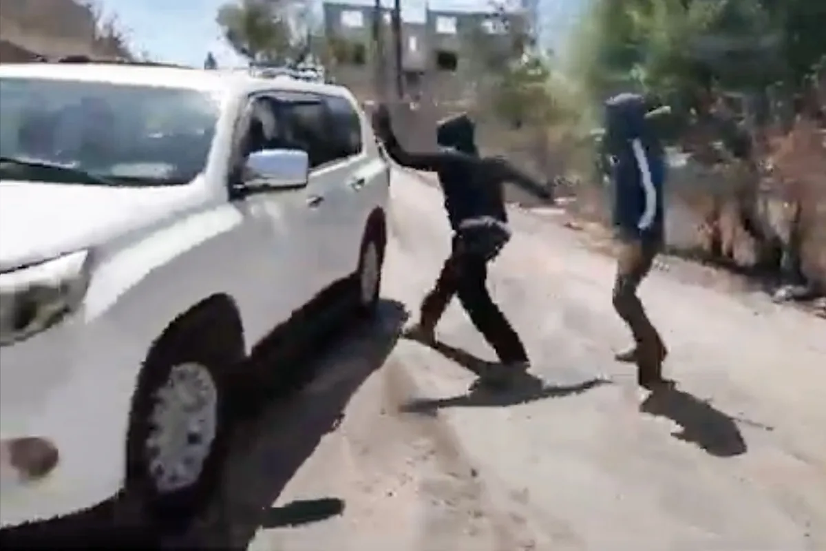 Palestinian woman and NBC News team attacked by masked Israeli settlers in West Bank