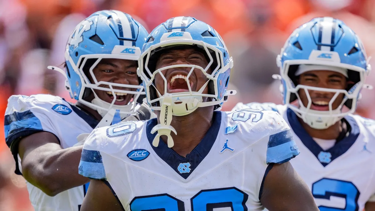 North Carolina leads Clemson 17-15 in fourth quarter in game delayed by lightning