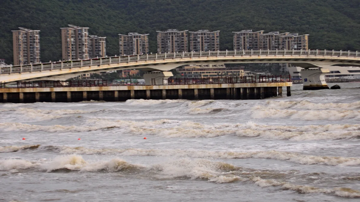 Three typhoons churn over Pacific as heavy rain hits southern China