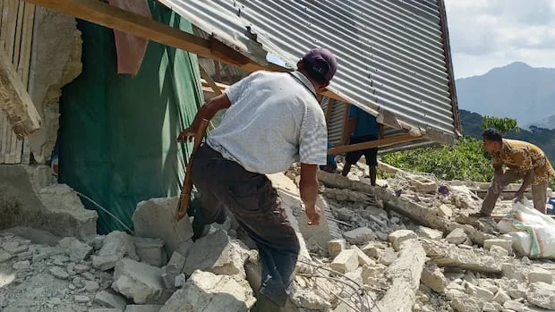 At least 38 people killed following 7.7 magnitude earthquake in Indonesia