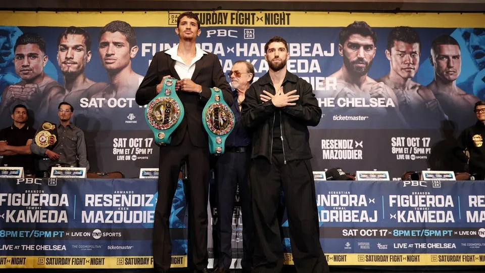 The Tallest Champion In Boxing Faces An Unbeaten Mandatory Who Gives Up 7 Inches