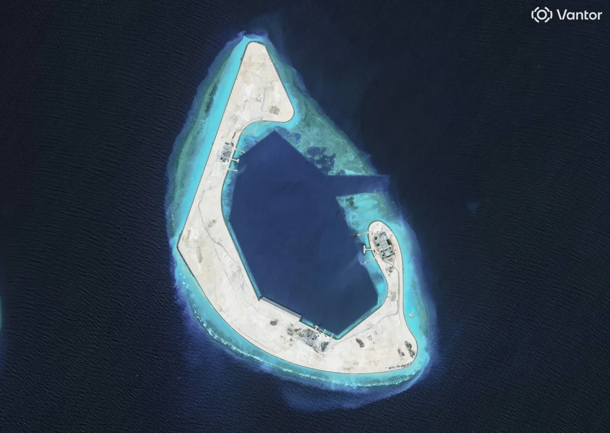 China finishes first phase of construction at South China Sea reef, images show